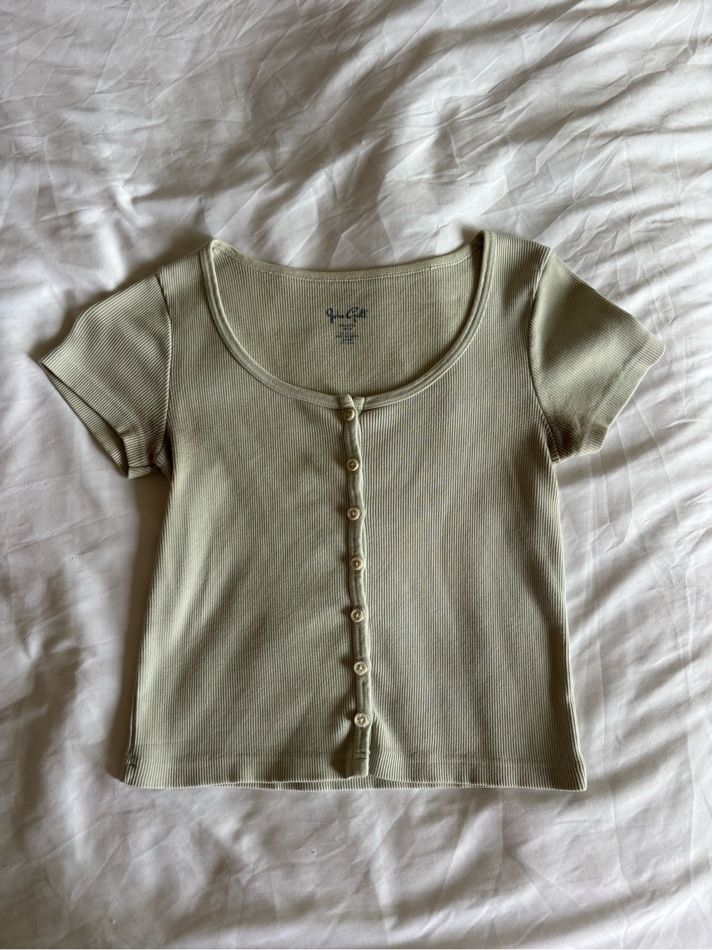 light green button down tee